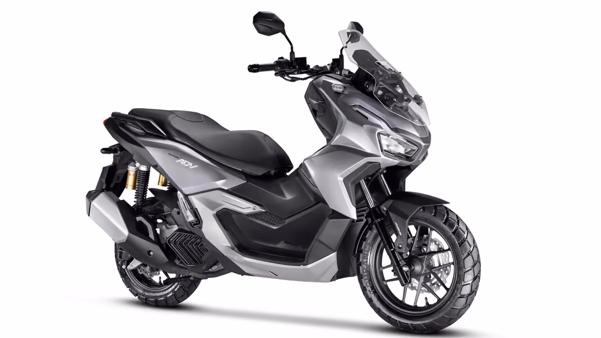 Honda ADV prata vista lateral dianteira direita